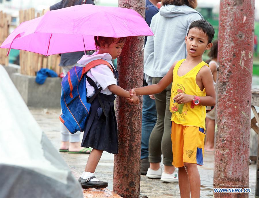 THE PHILIPPINES-MANILA-TROPICAL DEPRESSION HENRY