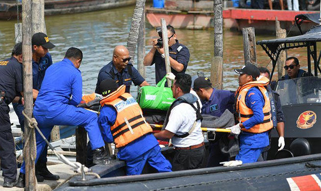 Two Chinese crew rescued from inside sand dredger capsized near Malaysia