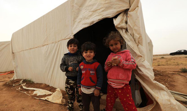 Syrian refugees at settlement in Mafraq, Jordan