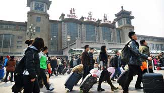 Railway stations witness return peak across China